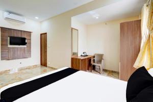 Postel nebo postele na pokoji v ubytování Super Hotel O Sriperambadhur formerly Radha Residency