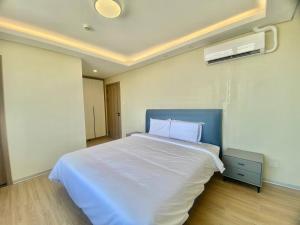 City Center Executive Hotel-Near Manila Airport and PITX客房内的一张或多张床位