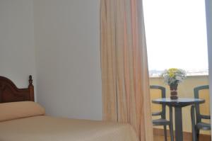 A seating area at Hotel Heredero