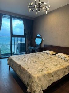 Ένα ή περισσότερα κρεβάτια σε δωμάτιο στο The Filmore Luxury Apartment