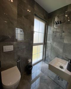Vannituba majutusasutuses Alko Hotel Bushat