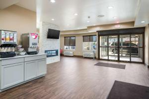 a large room with a kitchen and a store at Comfort Inn Bossier City Casino Area near Shreveport Downtown in Bossier City