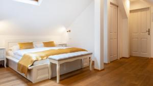 Posteľ alebo postele v izbe v ubytovaní Spa Beerland Chateaux – U Zlaté Hrušky / At Golden pear