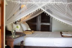 Katil atau katil-katil dalam bilik di Rest House Matara