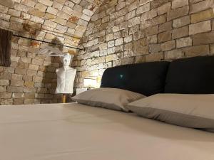 Postel nebo postele na pokoji v ubytování B&B Bari Vecchia R