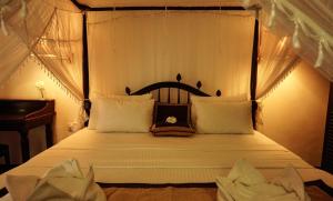 Katil atau katil-katil dalam bilik di Rest House Matara