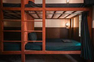 Letto o letti in una camera di Nest Jungle