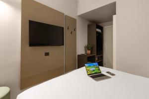 TV a/nebo společenská místnost v ubytování Energy Park Hotel