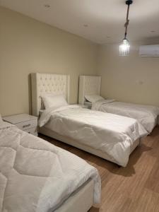 Ένα ή περισσότερα κρεβάτια σε δωμάτιο στο Belvedere chalet