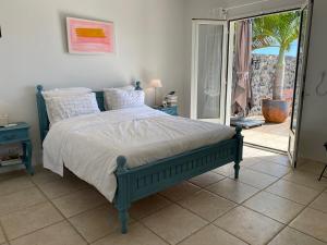 Voodi või voodid majutusasutuse Villa Sunset avec piscine miroir et vue panoramique toas +20 fotot