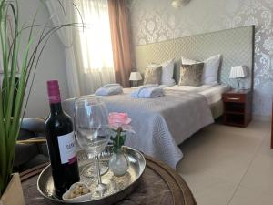 Postel nebo postele na pokoji v ubytování Villa TAAN Royal