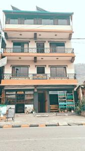 a building on the side of a street at Hotel Fewa Lake View in Pokhara