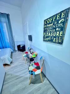 TV a/nebo společenská místnost v ubytování Core De Roma Suites + 35 fotografií