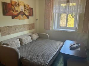 Letto o letti in una camera di Kořenov byt Alda