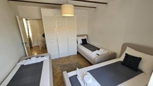 Katil atau katil-katil dalam bilik di Holiday Home Jan
