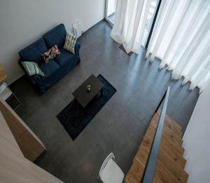 Χώρος καθιστικού στο The Chalet Kodaikanal