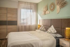 A bed or beds in a room at MeLuIs