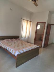 Ένα ή περισσότερα κρεβάτια σε δωμάτιο στο Serenity Springs +6 φωτογραφίες