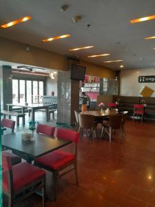 a restaurant with tables and chairs and a dining room at d'JHIA HOTEL in Nagoya +18 photos