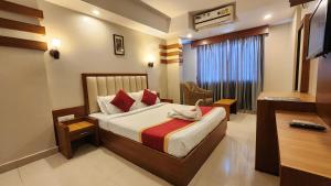 Ένα ή περισσότερα κρεβάτια σε δωμάτιο στο Hotel n pavilion