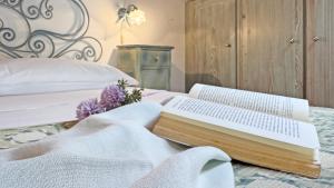 Postel nebo postele na pokoji v ubytování Dimora Agnese