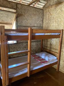 Postel nebo postele na pokoji v ubytování Sitio tourist inn