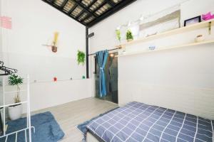 Postel nebo postele na pokoji v ubytování BKV Homestay