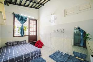 Postel nebo postele na pokoji v ubytování BKV Homestay
