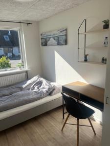 Postel nebo postele na pokoji v ubytování Herning Nord - Tjørring B&B