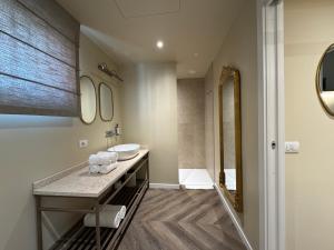 a bathroom with a sink and a mirror at Tenuta Acquaviva in Travagliato +80 photos