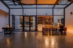 a person sitting at a table in a room at Letoh Letoh Sevilla in Seville +63 photos