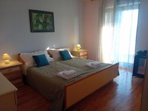 Posteľ alebo postele v izbe v ubytovaní house Divna