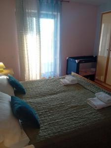 Posteľ alebo postele v izbe v ubytovaní house Divna