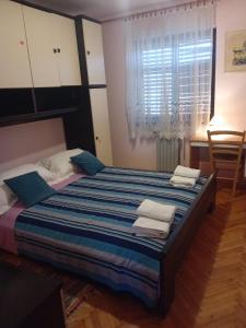 Posteľ alebo postele v izbe v ubytovaní house Divna