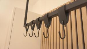 a group of drippingoons hanging from a wall at Ferienwohnung Reitemann in Oy-Mittelberg