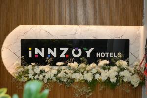 Galería fotográfica de Innzoy Hotels - DLF Road en Upal