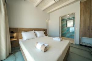 En eller flere senge i et værelse på Nafsika Xenia - Odysseus + 23 billeder