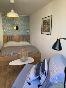 Postel nebo postele na pokoji v ubytování La Coquille - appartement cosy - centre - proche mer et casino