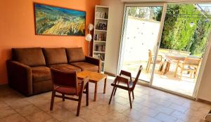 Posezení v ubytování Studio cosy en Provence