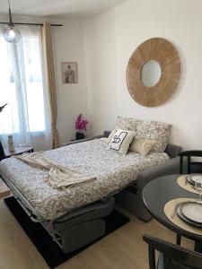 Ένα ή περισσότερα κρεβάτια σε δωμάτιο στο Fully-equipped studio Paris Disneyland RER E RER A
