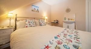 Llit o llits en una habitació de Mishnish Hotel