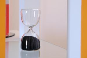 an hourglass sitting on top of a counter at Andrea's House in Locri
