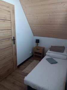 Katil atau katil-katil dalam bilik di Noclegi pod 13 Sandomierz