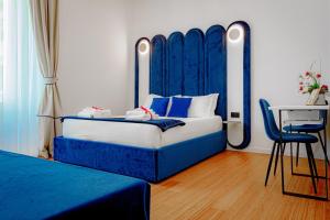 Postel nebo postele na pokoji v ubytování Historical Center