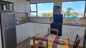 Kuchyň nebo kuchyňský kout v ubytování 33 on Goedehoop Apartment