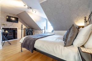 Llit o llits en una habitació de Mishnish Hotel