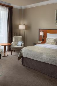 Postel nebo postele na pokoji v ubytování Jalta Boutique Hotel + 37 fotografií