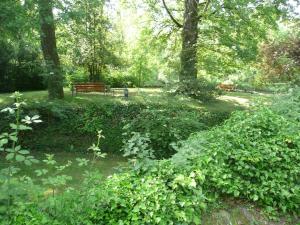 A garden outside Hotel Can Blanc