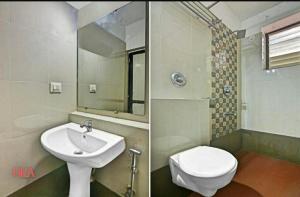 Kopalnica v nastanitvi Ora Classic " Budget Stay Near to Calangute Beach " Free WiFi + 24 fotografij
