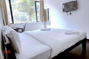 Postelja oz. postelje v sobi nastanitve Ora Classic " Budget Stay Near to Calangute Beach " Free WiFi